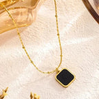 Charm of the Night Clover Necklace